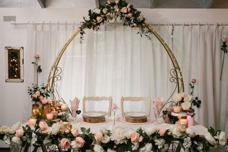 Gold Cinderella Arch With Flowers