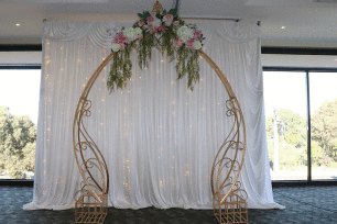 Gold Cinderella Arch With Flowers