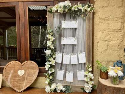 Rustic Seating Plan Display with flowers